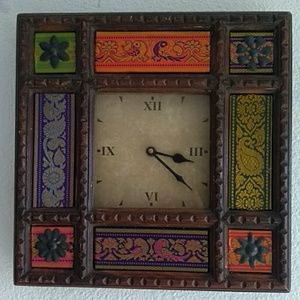 Brocade Indian wall clock carved